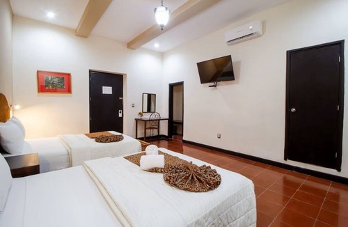 Centro Hotel | Colonial Comfort Close to Parks & Tourist Spots: 4-Stay, 2 Double Rooms