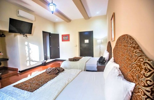 Centro Hotel | Colonial Comfort Close to Parks & Tourist Spots: 4-Stay, 2 Double Rooms