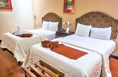 Centro Hotel | Colonial Comfort Close to Parks & Tourist Spots: 4-Stay, 2 Double Rooms