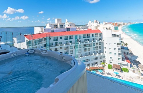 Zona Hotelera Condo | Combo #334-Tim’s Ocean Condos – Beachfront – 8br/7.5bth Hot Tub on Terrace!