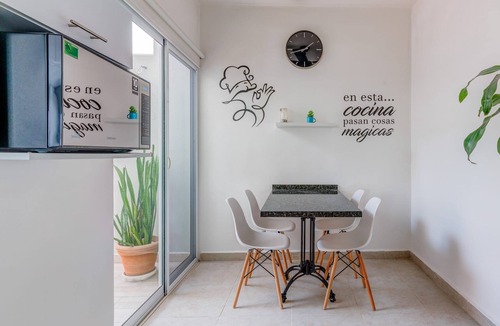 Puerto Juarez Apartment | Comfortable Family Retreat: Pool, BBQ & Playground