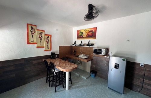 Loche House | Cozy fully equipped house just one block away from a pristine beach!