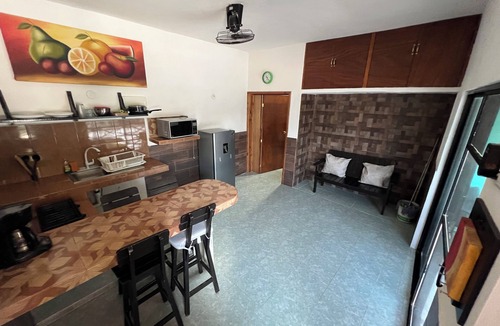 Loche House | Cozy fully equipped house just one block away from a pristine beach!