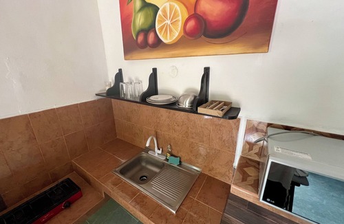 Loche House | Cozy fully equipped house just one block away from a pristine beach!