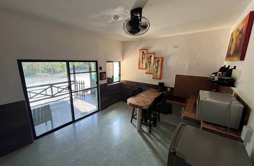 Loche House | Cozy fully equipped house just one block away from a pristine beach!