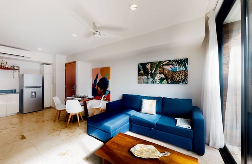 Zazil-ha Apartment | Dog-friendly luxe apartment in a great location with a pool, gym, & balcony