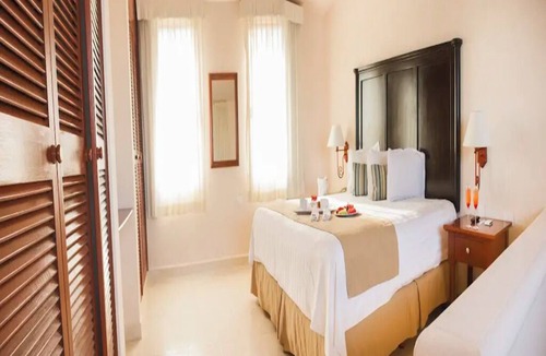 Puerto Juarez Resort | Duplex-Style Ocean View Studio with Balcony at Family Friendly Cancun Resort