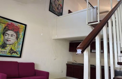 Puerto Juarez Resort | Duplex-Style Ocean View Studio with Balcony at Family Friendly Cancun Resort