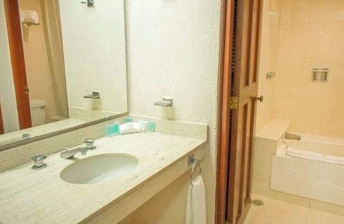 Puerto Juarez Resort | Duplex-Style Ocean View Studio with Balcony at Family Friendly Cancun Resort