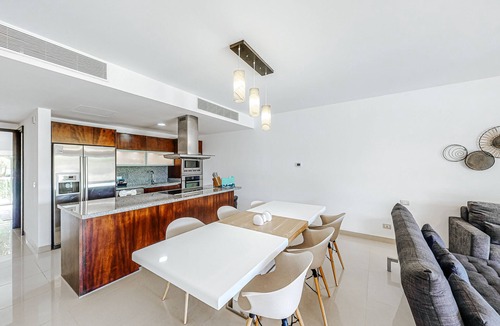 Ejidal Condo | Elegant condo with a private pool, deck, hammock, free WiFi, and central AC
