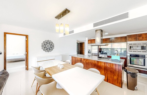 Ejidal Condo | Elegant condo with a private pool, deck, hammock, free WiFi, and central AC