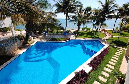 Akumal Condo | Enjoy the ambience of this beachfront condo located in South Akumal!