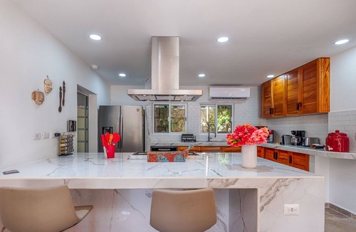 Akumal Condo | Family getaway in this charming townhouse just steps away from Yal Ku Laggon!