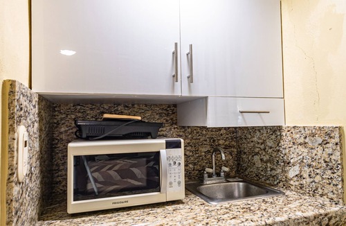 Playacar Fase I Apartment | Free laundry. Studio w/2 beds. AC + Shower. 1mn walk to a beautiful beach.