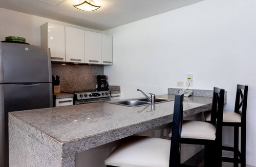Puerto Juarez Condo | Ground Floor Unit with Views of the gardens and pool at The Elements by BRIC