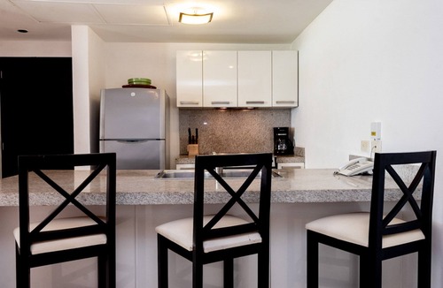 Puerto Juarez Condo | Ground Floor Unit with Views of the gardens and pool at The Elements by BRIC
