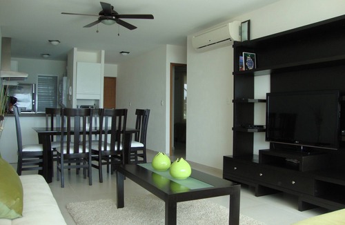 Puerto Juarez Apartment | HOME OFFICE?.ENJOY IT AT CANCUN, AFFORDABLE NICE BEACHFRONT CONDO.