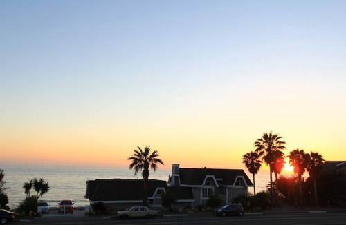 Encinitas House | Impeccable Cape Cod Oceanfront Home Overlooking Swami's Beach.