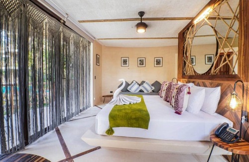 Tulum Hotel | KAN Eco-Wellness tree house jungle view & cenote!
