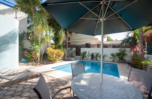 Puerto Morelos Apartment | Large studio with king bed, full kitchen, sofa bed. Half wall separating.