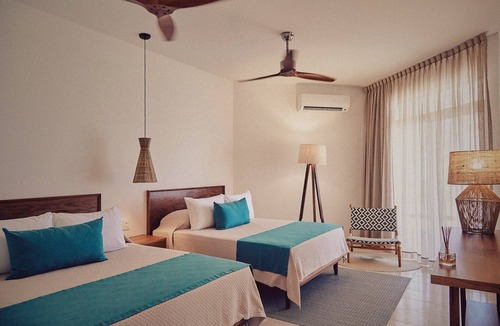 Tulum Hotel | Located on beautiful turquoise waters, Casa Altamar Tulum
