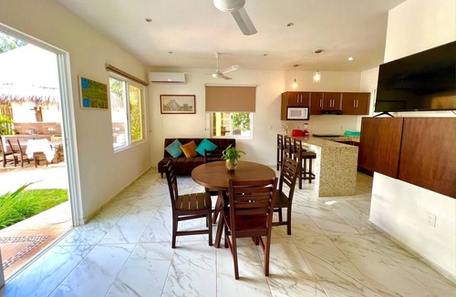 Isla Mujeres Condo | Lovely ground floor condo with pool and roof in Punta Sur