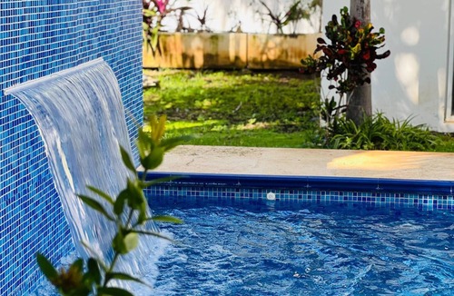 Isla Mujeres Condo | Lovely ground floor condo with pool and roof in Punta Sur
