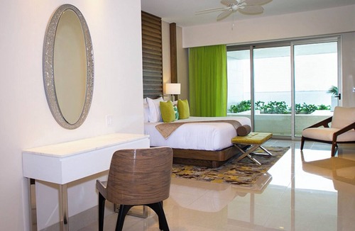 Puerto Juarez Resort | Luxurious 3 Bedroom Oceanfront Suite right on the beach of Cancun!