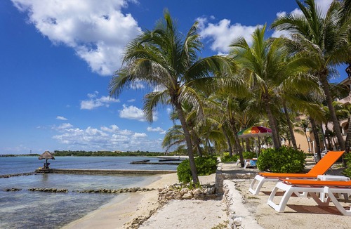 Puerto Aventuras Apartment | Luxury Caribbean Beachfront Oceanview 4 Bedroom Retreat in Puerto Aventuras