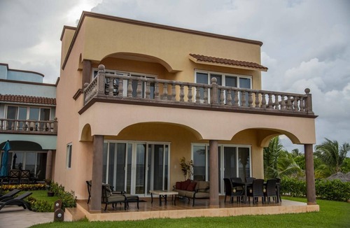 Puerto Morelos Condo | Luxury three bedroom villa facing the Caribbean Sea with a large terrace