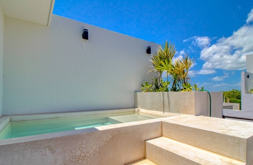 Villas Tulum Apartment | Luxury tropical apartment with balconies, hot tub, hammock, & AC - pool access