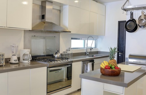 Gonzalo Guerrero Condo | Modern 2BR, 1 block to Beach & 5th Ave, Roof Pool, Garage, Quieter Corner Street