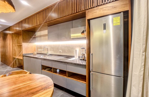 Zama Apartment | Modern second floor studio with pool, partial AC, and balcony