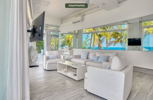 Conchas Chinas Condo | Ocean Front 3 Bedroom/3 bath modern condo with huge floor to glass doors