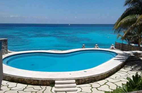 San Miguel Condo | Oceanfront condo on the bluest ocean of Cozumel island