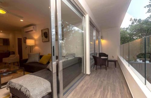 Gonzalo Guerrero House | One Bedroom, Great Location, Large Roof Pool with beautiful views, Gym included