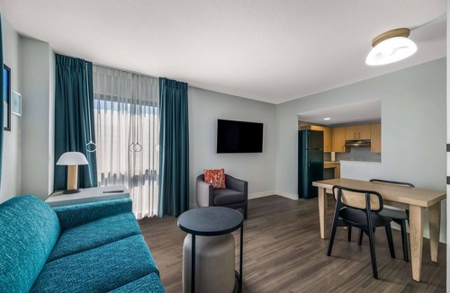 Florida Central Atlantic Coast Hotel | Perfect for Groups! Spacious Unit with Full Kitchen, Outdoor Pool, Pets Allowed!