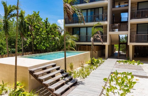 Isla Holbox Hotel | Pool View Loft Steps From The Ocean in Punta Cocos - C101