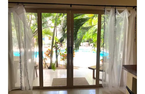 Zama Condo | Poolside paradise condo + jacuzzi + parking + STRONG WiFi