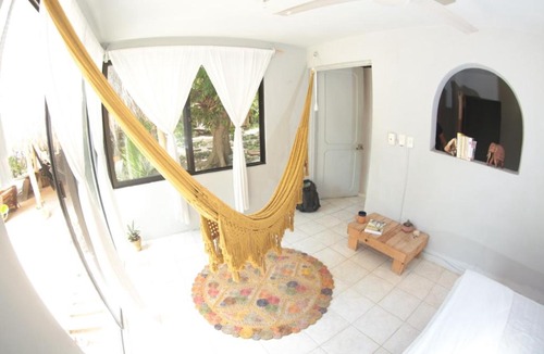 Bacalar Hotel | Posada Lulú la Bruja Yoga Lodge