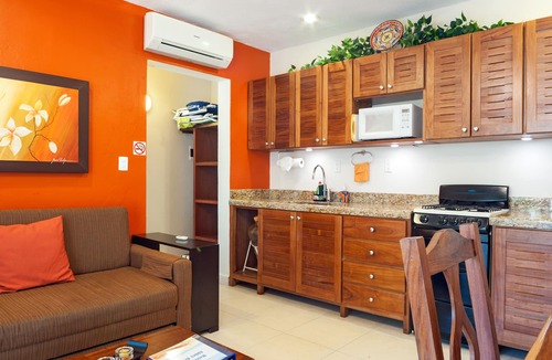Puerto Morelos Apartment | Private patio overlooking the pool. 2-minute stroll to the beach.