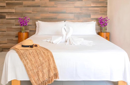 Luis Donaldo Colosio Apartment | Quiet Mornings, King & 2BR Suites, Sleeps 2-8, Kitchen WiFi AC, Beach, 5th Ave, ADO & Ferry 4 Min