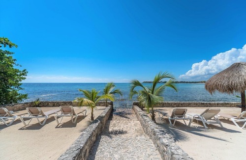 Akumal Condo | Romantic, charming condo with shared pools and magnificent view of the ocean!
