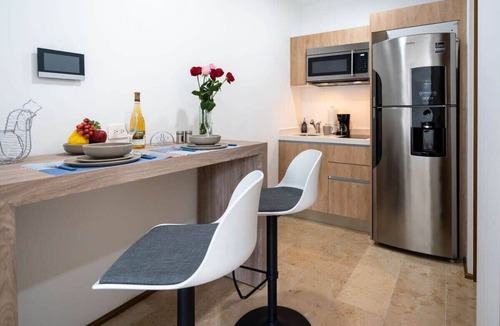 Centro Apartment | Rooftop Infinity Pool | 5th Ave Steps Away