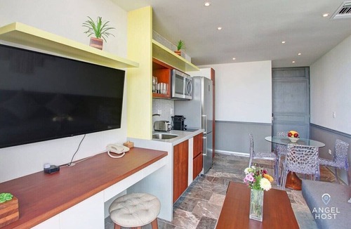 Downtown Condo | Rooftop Paradise with Pools Overlooking the Ocean