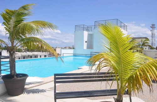 Centro Apartment | Rooftop Pool | Balcony | 3 blocks to 5th Avenue