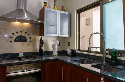Playacar Fase I Condo | Second Floor Unit with views of the gardens and pool at Paseo del Sol by BRIC