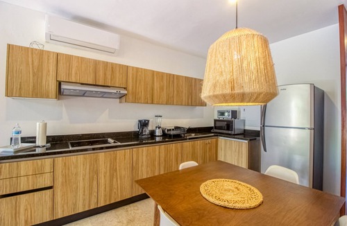 La Veleta Apartment | Serene, ground-floor getaway with private & shared pool, washer/dryer, & patio