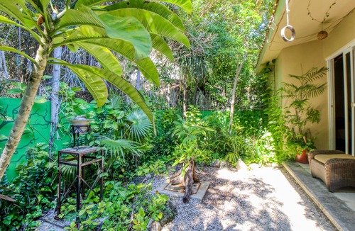 Majahual House | Spanish-style home with pool, W/D, 2 living areas & 2 kitchenettes - near beach
