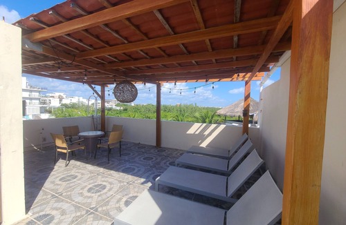 Luis Donaldo Colosio House | Steps from the beach 3-bedroom plus loft bedroom townhome, WiFi, AC & roof top.